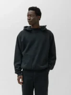 Model wearing A.pressse Vintage Attached Snap Hood Sweat Parka Black side view