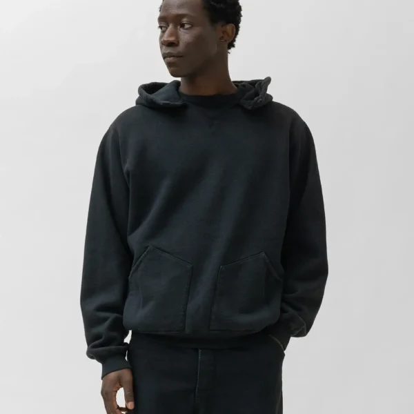 Model wearing A.pressse Vintage Attached Snap Hood Sweat Parka Black side view