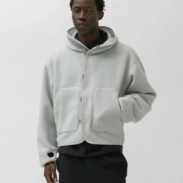 Model wearing A.pressse Wool Fleece Hoodie Natural Gray side view
